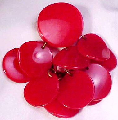 BP99 red bakelite disc charm pin